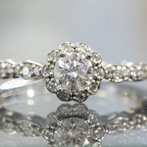 Diamond and 14K White Gold Halo Style Engagement Ring