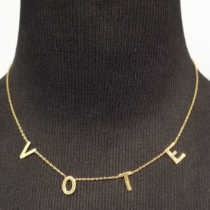 Vote necklace featuring 18K gold-plated sterling silver metal -length adjusts