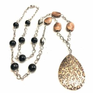 Black, copper& silver colored necklace with leopard print pendant