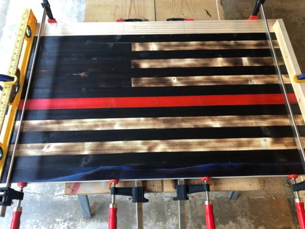 Hand crafted wooden Thin Red Line flag