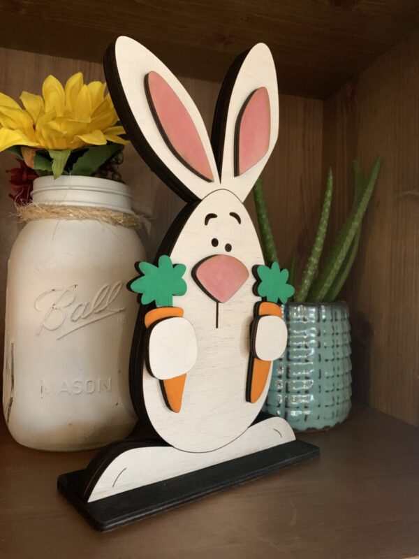 Carrot Holding Easter Bunny Decor