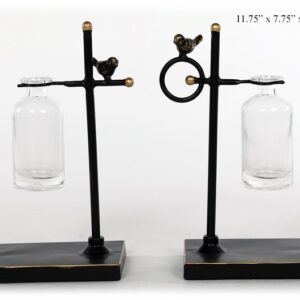 Glass jar on metal stand with bird