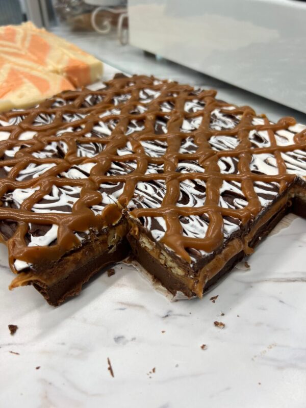 TorTush (Turtle) Fudge – Chocolate fudge with a gooey caramel nut center and white chocolate/ caramel topping