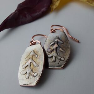 Petite silvery pine tree earrings in with copper tones