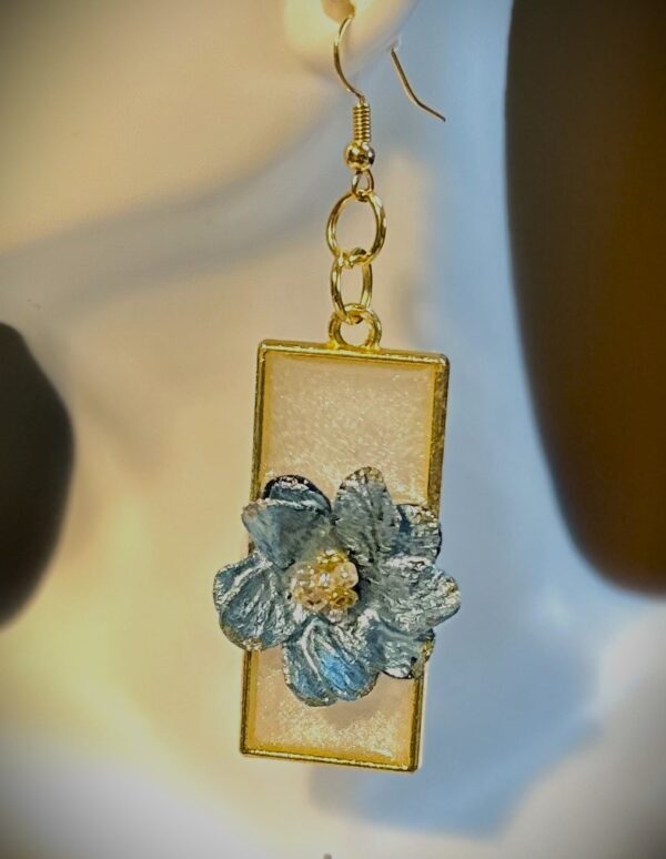 White Pearlized Resin with Added Blue Flower