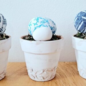 Set of 3 white distressed mini clay pots with eggs
