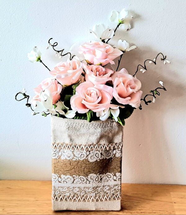 Wood and fabric wall pocket with flowers