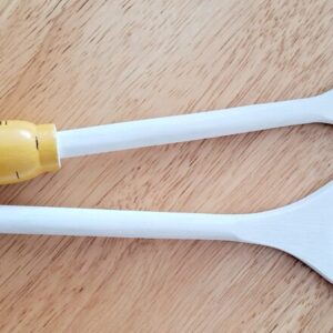 Set of two white and yellow honeybee spoons
