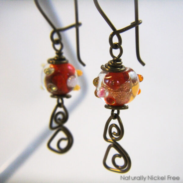 Red Lampwork Glass Earrings with Niobium Wirework