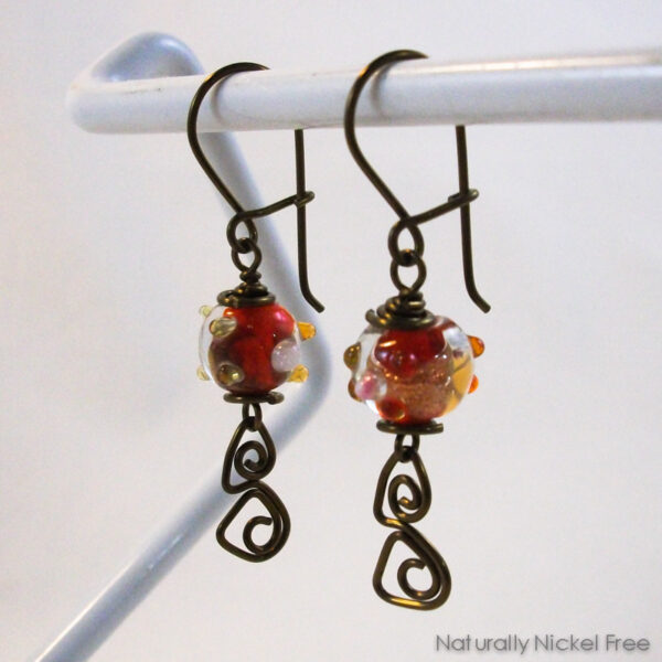 Red Lampwork Glass Earrings with Niobium Wirework