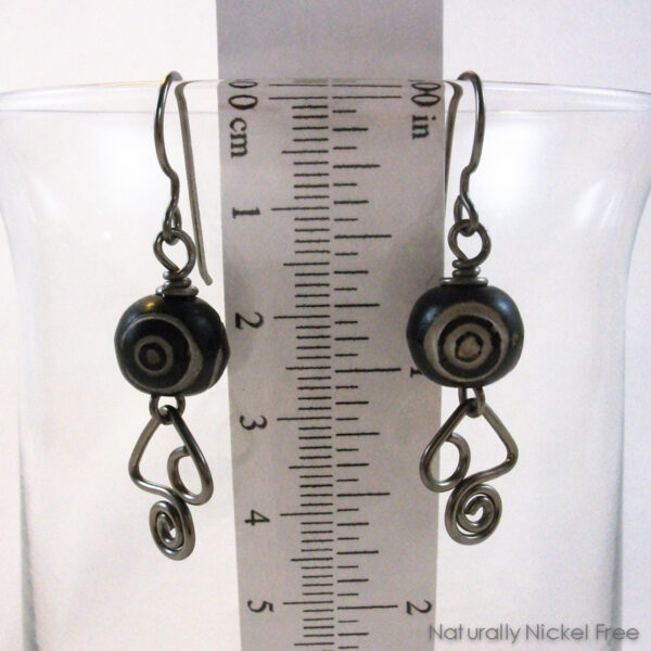 Dzi Style Carved Bead Earrings with Abstract Wire Design