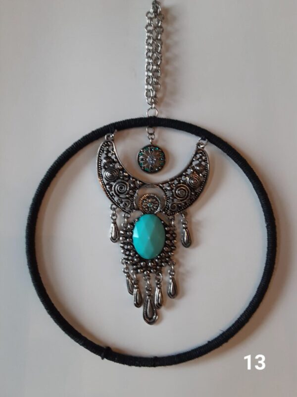 Black crescent with turquoise bead