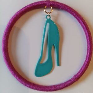 Turquoise shoe in pink ring