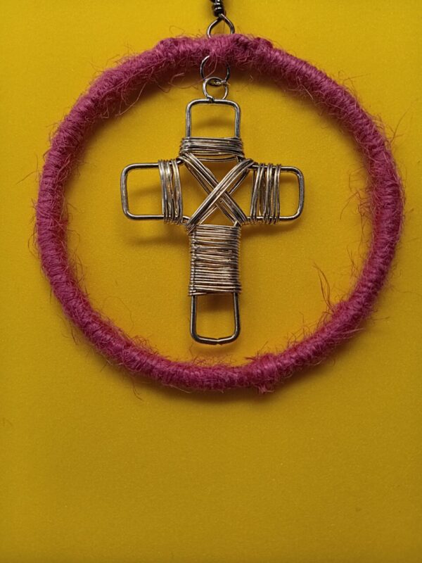 Silver tone wire wrapped cross