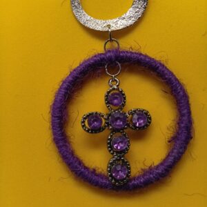 Small purple rhinestone cross