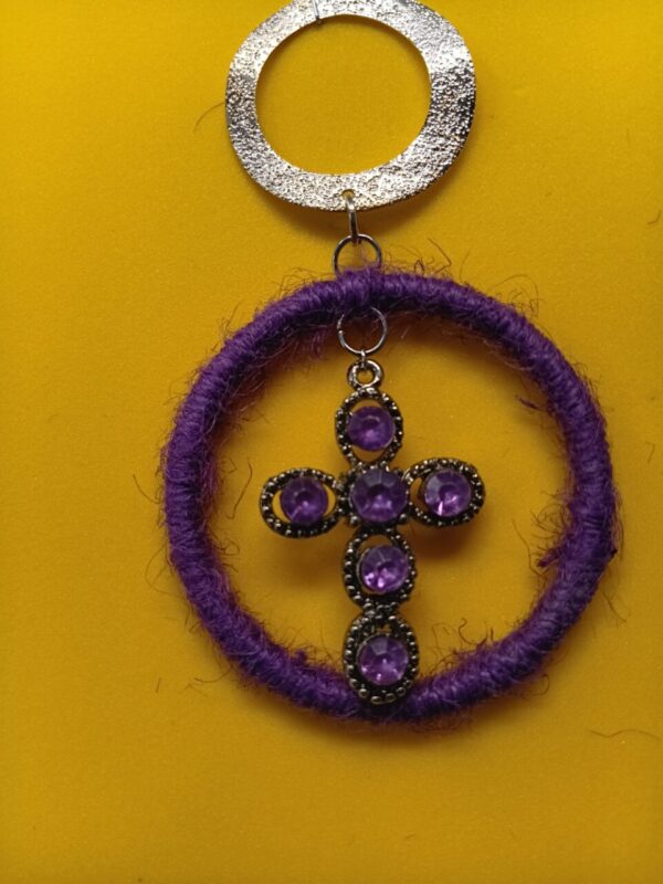 Small purple rhinestone cross