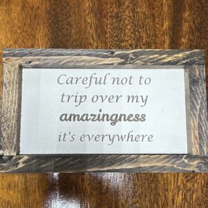 Careful not to trip over my amazingness sign