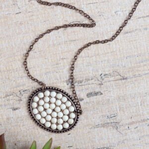 Bumpily Bamboozled Bronze Necklace With A Cream Pendant