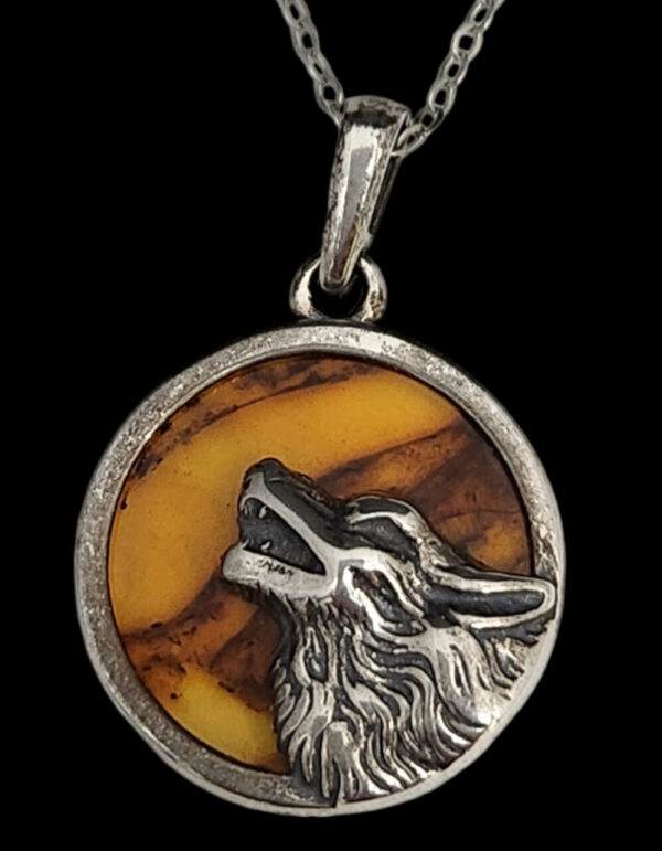 Amber wolf necklace in sterling silver