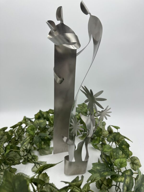 A New Family in Stainless Steel by Gail Chavenelle