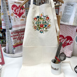 Shop Iowa Rosemaling Uffda Apron Rosemaling Uffda Apron