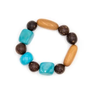 Brown and teal bracelet made from tagua nut, bombona seeds, and wood