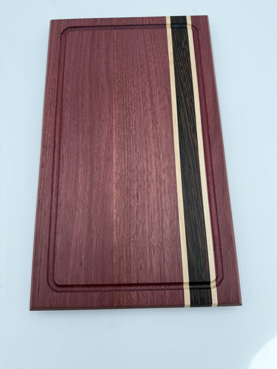 Shop Iowa Exotic Wood Cutting Board, Purple Heart Wenge Maple, Juice Groove, Brass Feet, 16.75x10x.75, Handmade, Food Safe Exotic Wood Cutting Board, Purple Heart Wenge Maple, Juice Groove, Brass Feet, 16.75x10x.75, Handmade, Food Safe