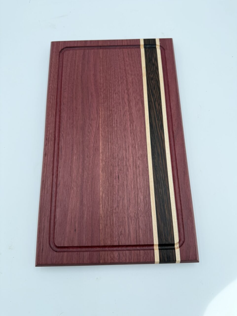 Shop Iowa Exotic Wood Cutting Board, Purple Heart Wenge Maple, Juice Groove, Brass Feet, 16.75x10x.75, Handmade, Food Safe Exotic Wood Cutting Board, Purple Heart Wenge Maple, Juice Groove, Brass Feet, 16.75x10x.75, Handmade, Food Safe